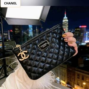 Chanel Black Quilted Clutch with Gold Accent